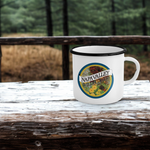 White mug with 'Napa Valley Brewing Company' logo on a wooden surface with a forest background