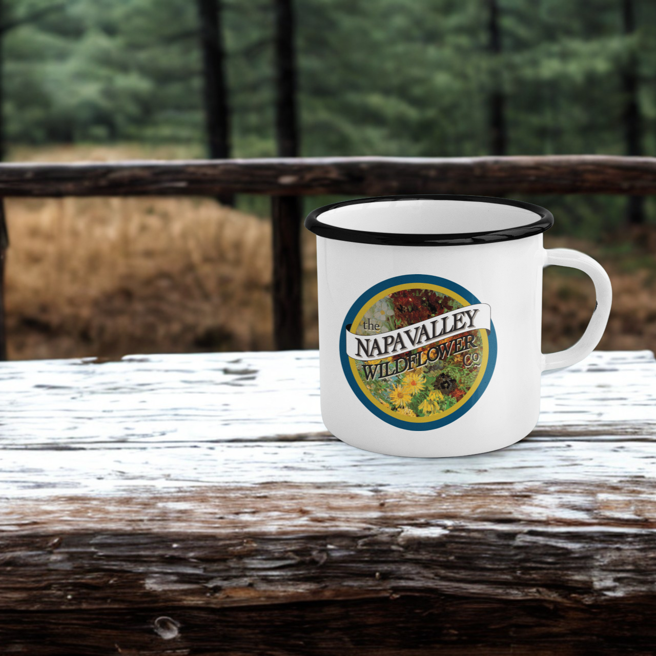 White mug with 'Napa Valley Brewing Company' logo on a wooden surface with a forest background