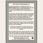 A square black-and-white printed informational card for The Napa Wildflower Co., with paragraphs of text about a mustard blend and vineyard planting instructions.