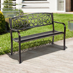 Decorative metal bench with 'WELCOME' text on a wooden deck