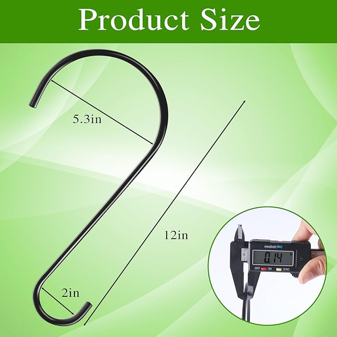 Black metal hook with measurements on a green background