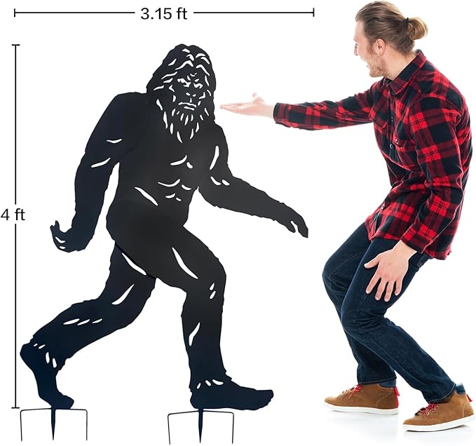 Person next to a large black silhouette of a creature, likely Bigfoot, with height measurements indicated.