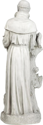 Statue of a religious figure in a long robe holding a book, back view.