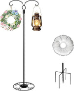 Decorative stand with lantern, wreath, and decorative item on a white background