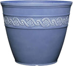 Blue decorative pot with a white floral pattern on a white background