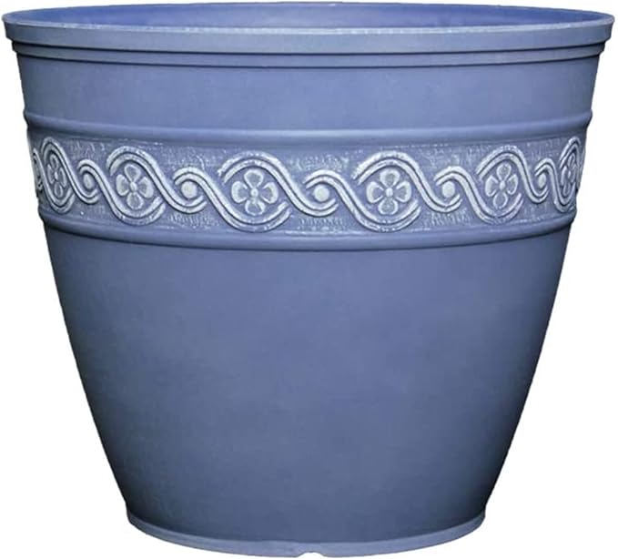 Blue decorative pot with a white floral pattern on a white background