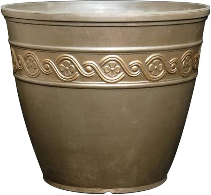 Decorative brown pot with embossed pattern on a white background