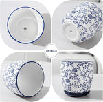 Ceramic mug with blue floral pattern on a white background
