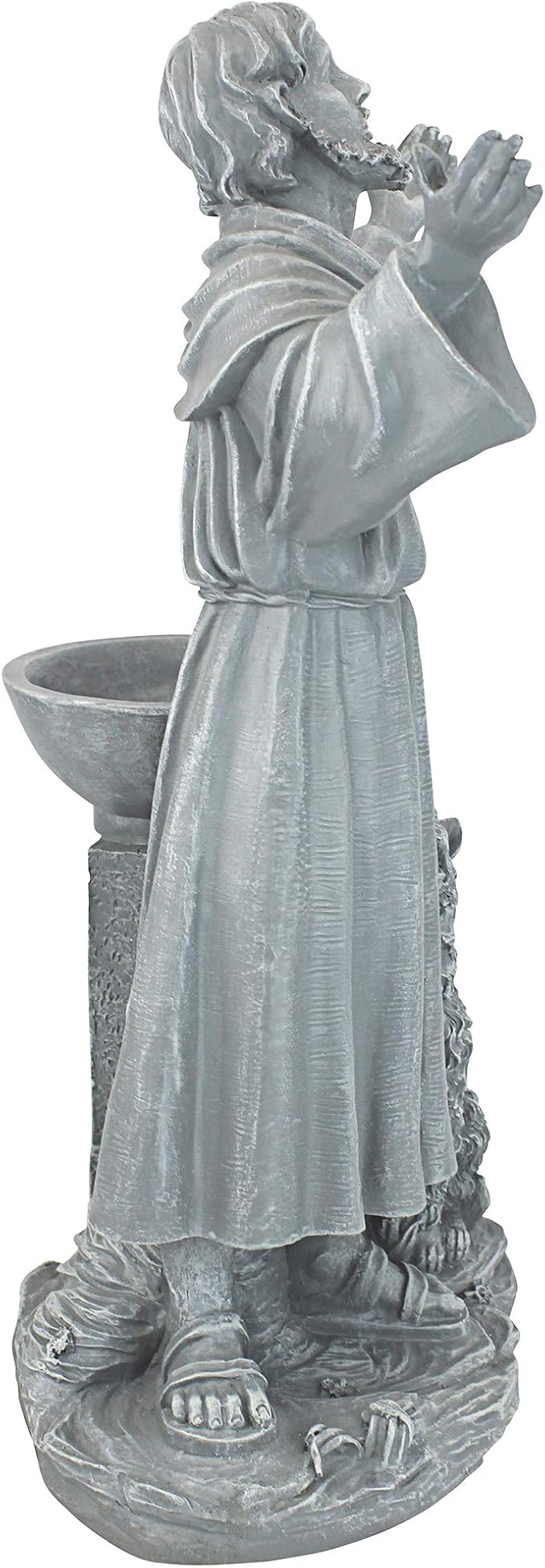 Statue of a monk with a bowl and candle, likely made of stone or concrete.