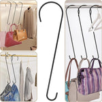 Hanging organizer with multiple hooks displaying bags and clothes.