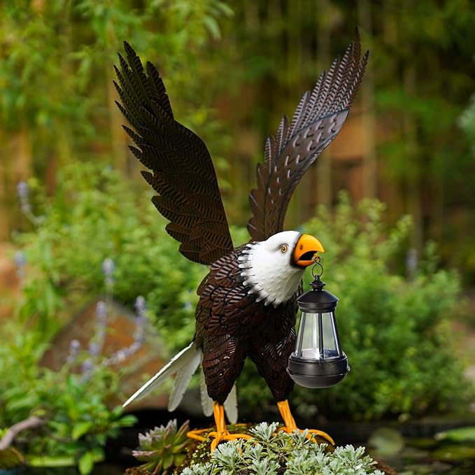 Decorative eagle holding a lantern against a natural background