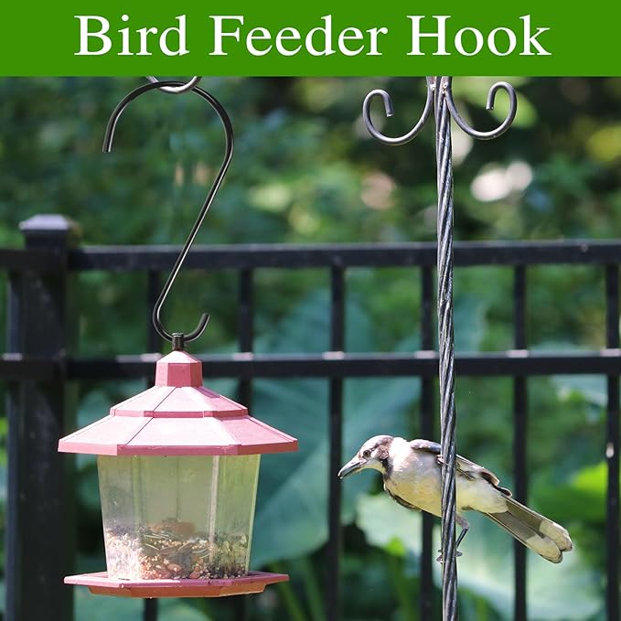 Bird feeder hook with a bird feeder and a bird perched on it, against a green background.