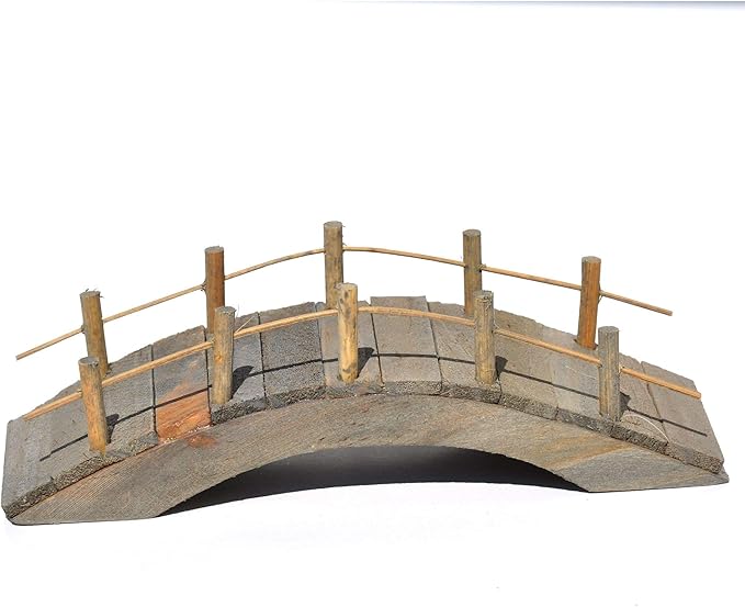Model of a stone bridge with wooden railings on a white background