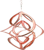 Copper-colored wind spinner on a white background