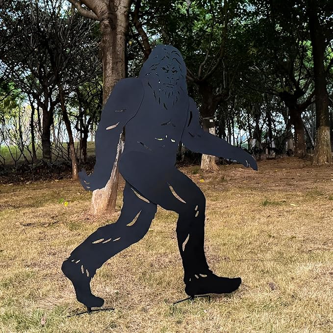 Metallic Bigfoot silhouette in a forest setting