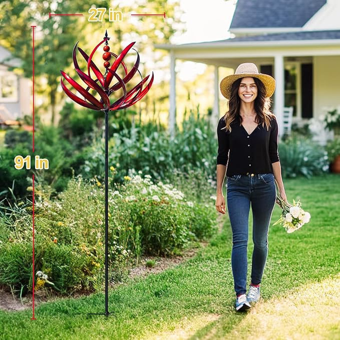 Woman standing next to a tall red garden sculpture with measurements, in a garden setting.