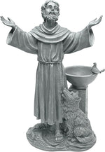 Statue of a religious figure with outstretched arms and a wolf at his feet on a white background
