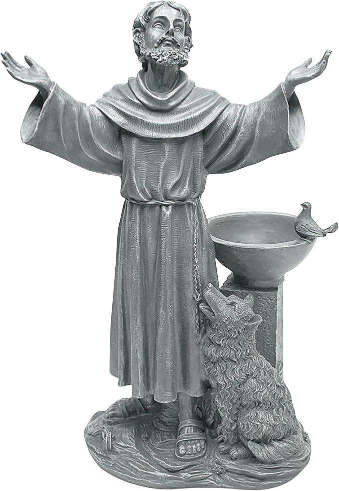Statue of a religious figure with outstretched arms and a wolf at his feet on a white background