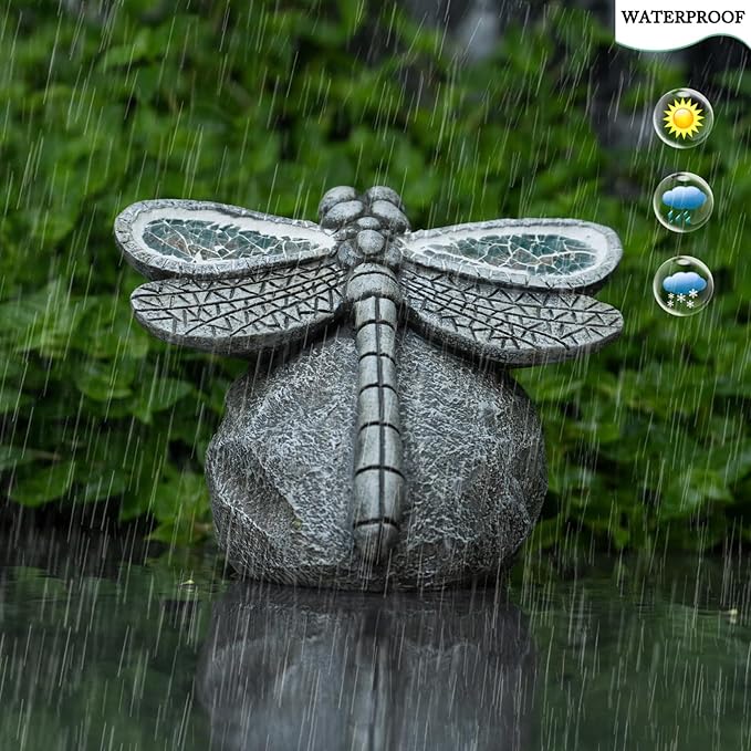 Dragonfly-shaped garden ornament in the rain with waterproof feature icons displayed.