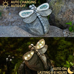 Dragonfly-shaped solar light on a rock with text indicating charging and auto-off/auto-on features.
