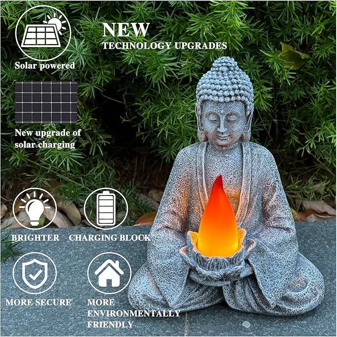 Buddha statue with solar panel and candle, surrounded by greenery