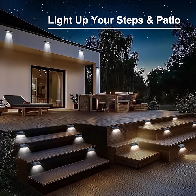 Outdoor patio with illuminated steps and deck at night