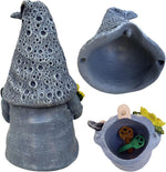 Gnome figurine with textured hat and hidden compartments on a white background