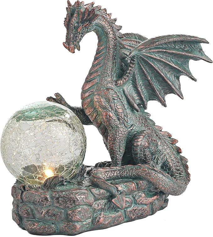 Dragon statue with a crystal ball on a white background