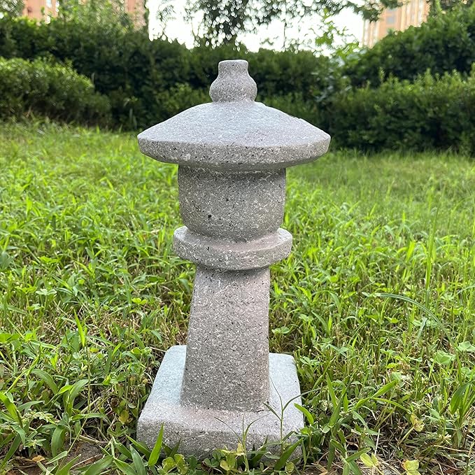 Stone lantern in a grassy outdoor setting