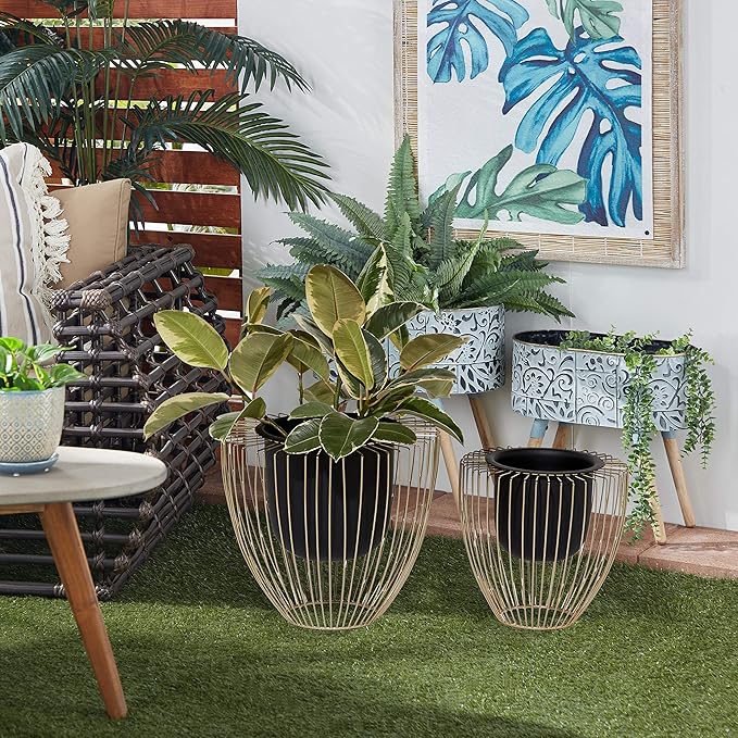 Decorative wire planters with plants on a patio