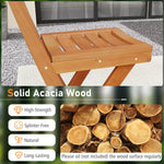 Wooden bench with solid acacia wood feature and stack of logs below.