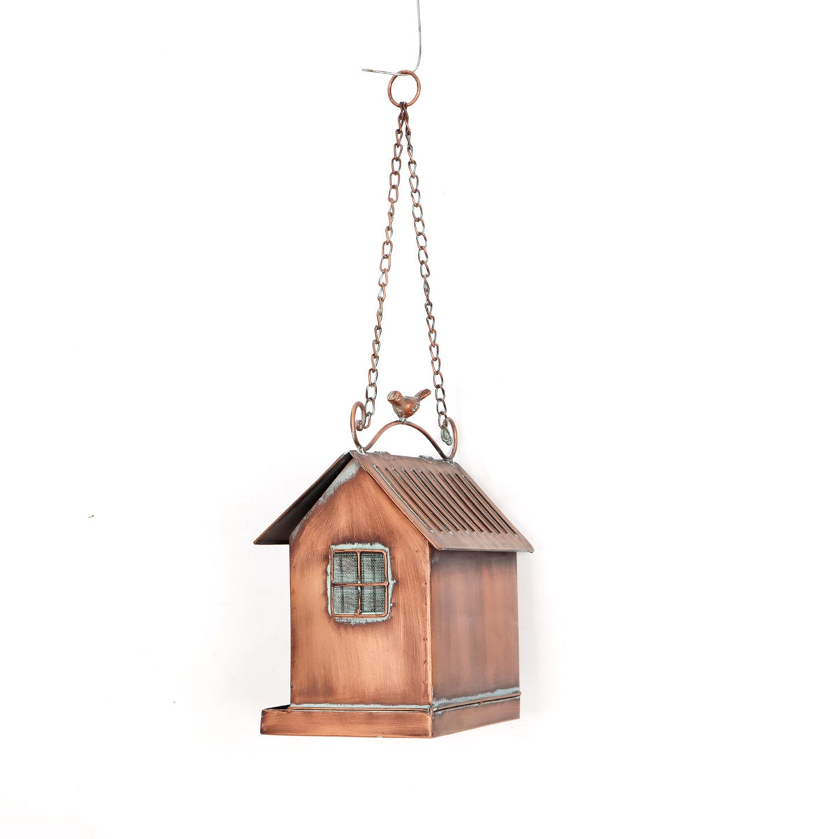 A copper birdfeeder against a white background.