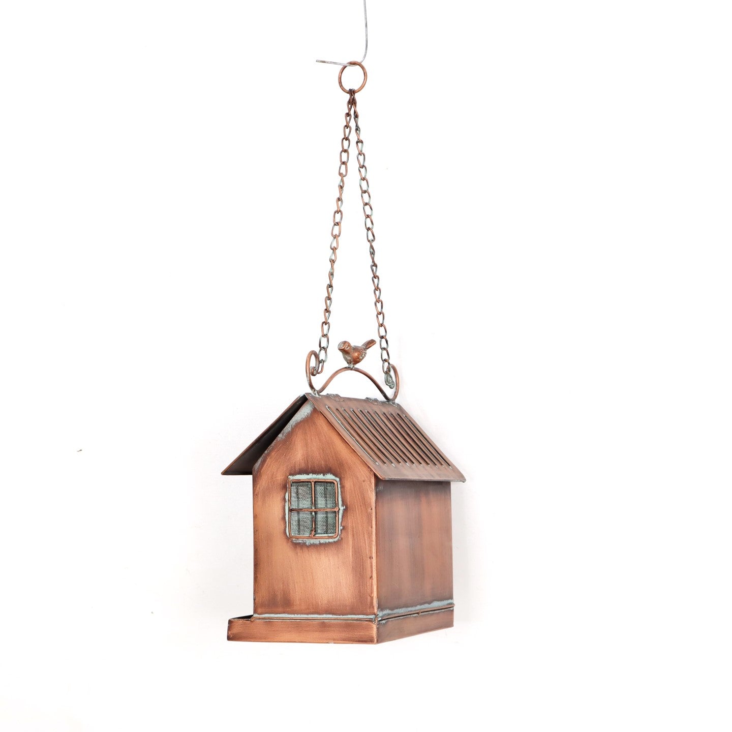 A copper birdfeeder against a white background.