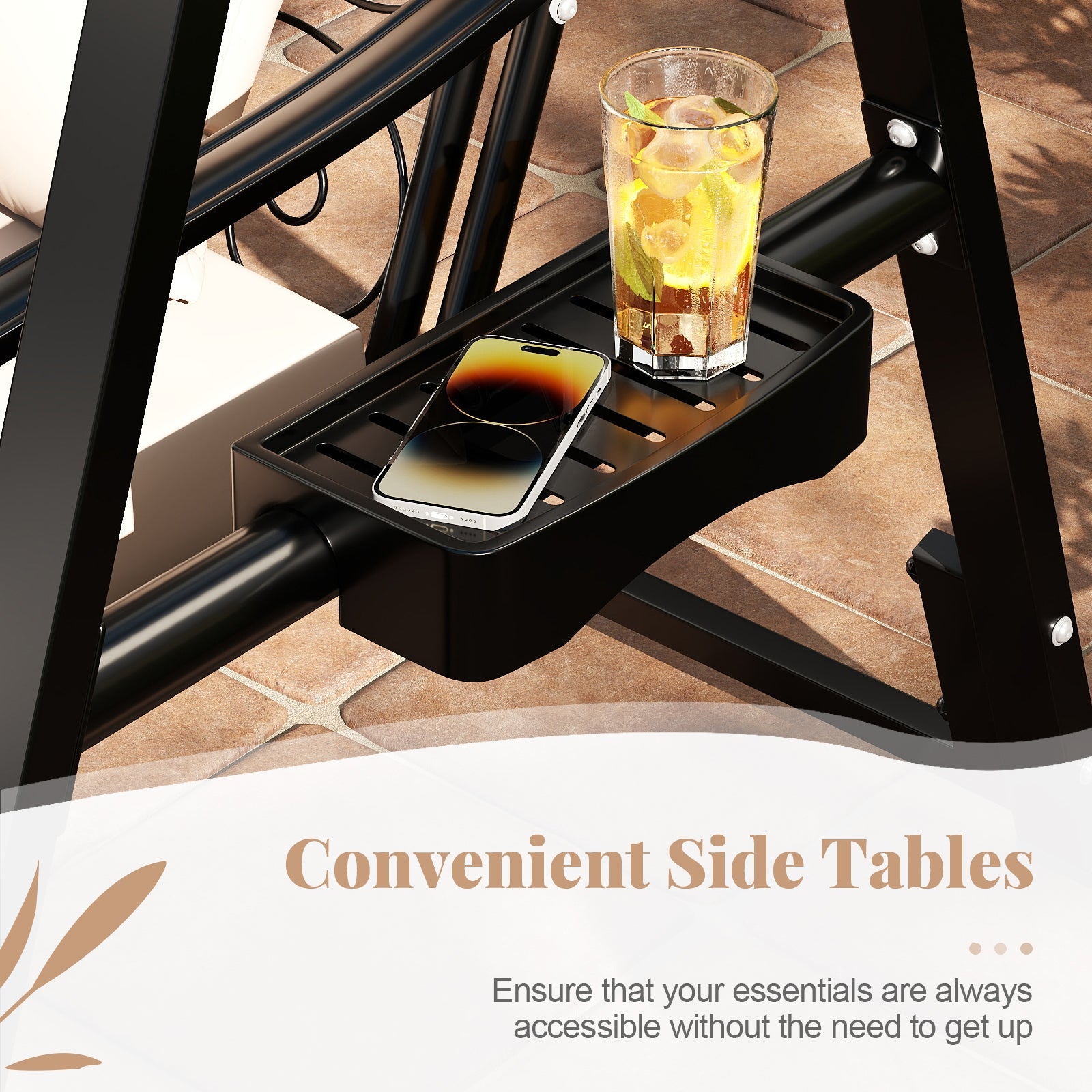 Black side table attached to a chair with a glass and phone on it, on a patio.