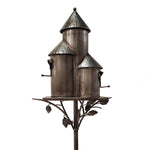 Decorative metal birdhouse with multiple compartments on a white background