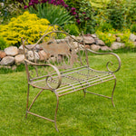Decorative garden bench with animal design on a grassy area