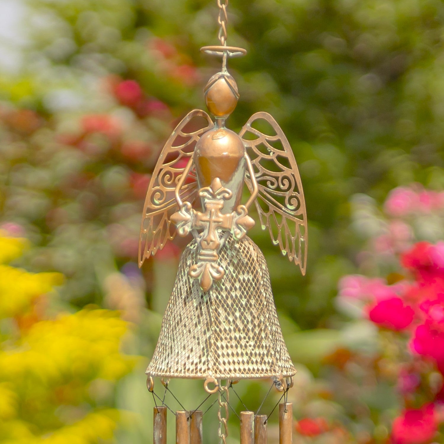 Decorative angel wind chime with floral background