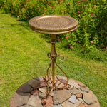Dark gold bird feeder plate on a pedestal