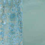 A split view of a textured ceramic tile or tile sample: the left side shows a detailed close-up of a blue, beige, and white bubbled glaze pattern, while the right side shows a smooth, solid pale sage green glaze finish.