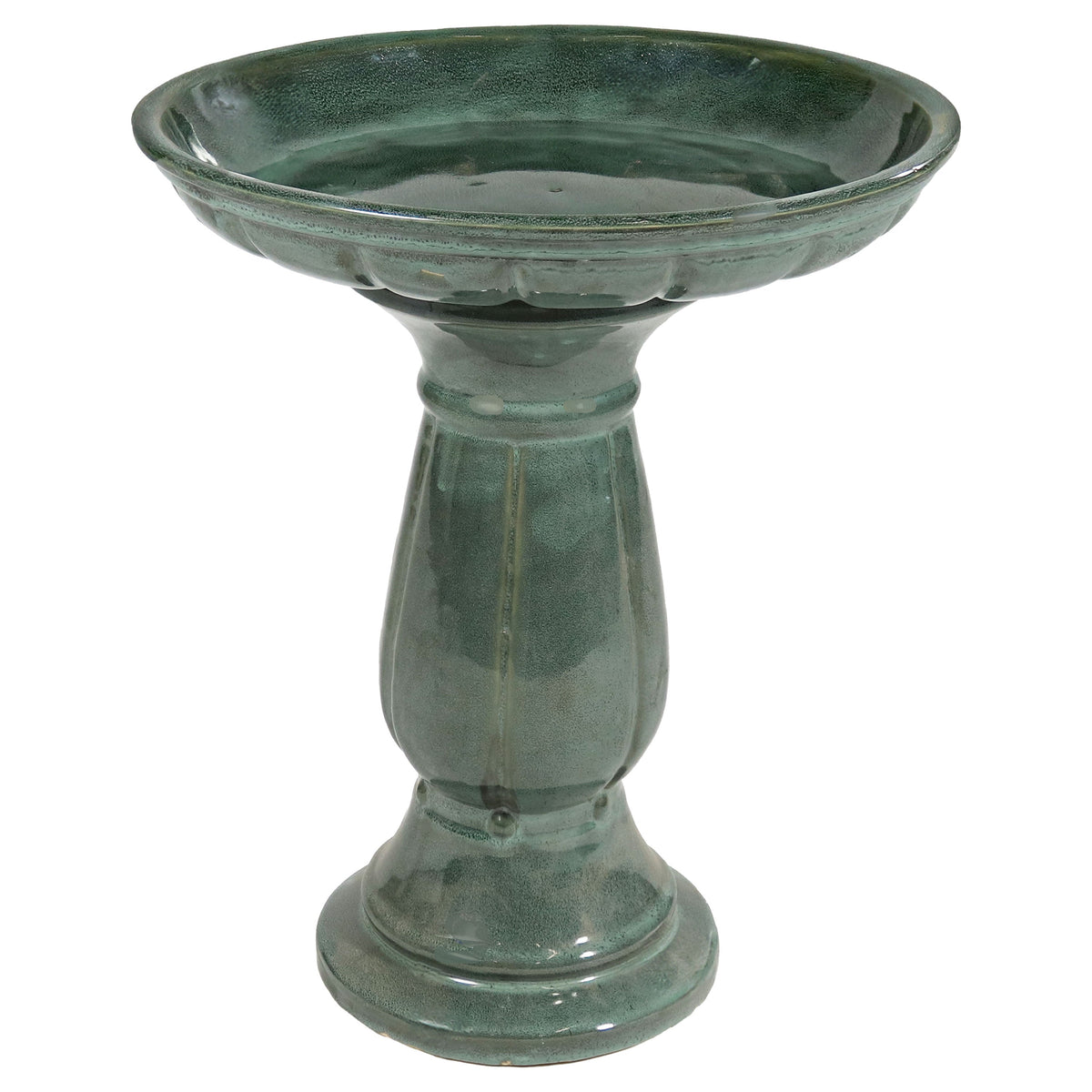 Green ceramic bird bath on a white background