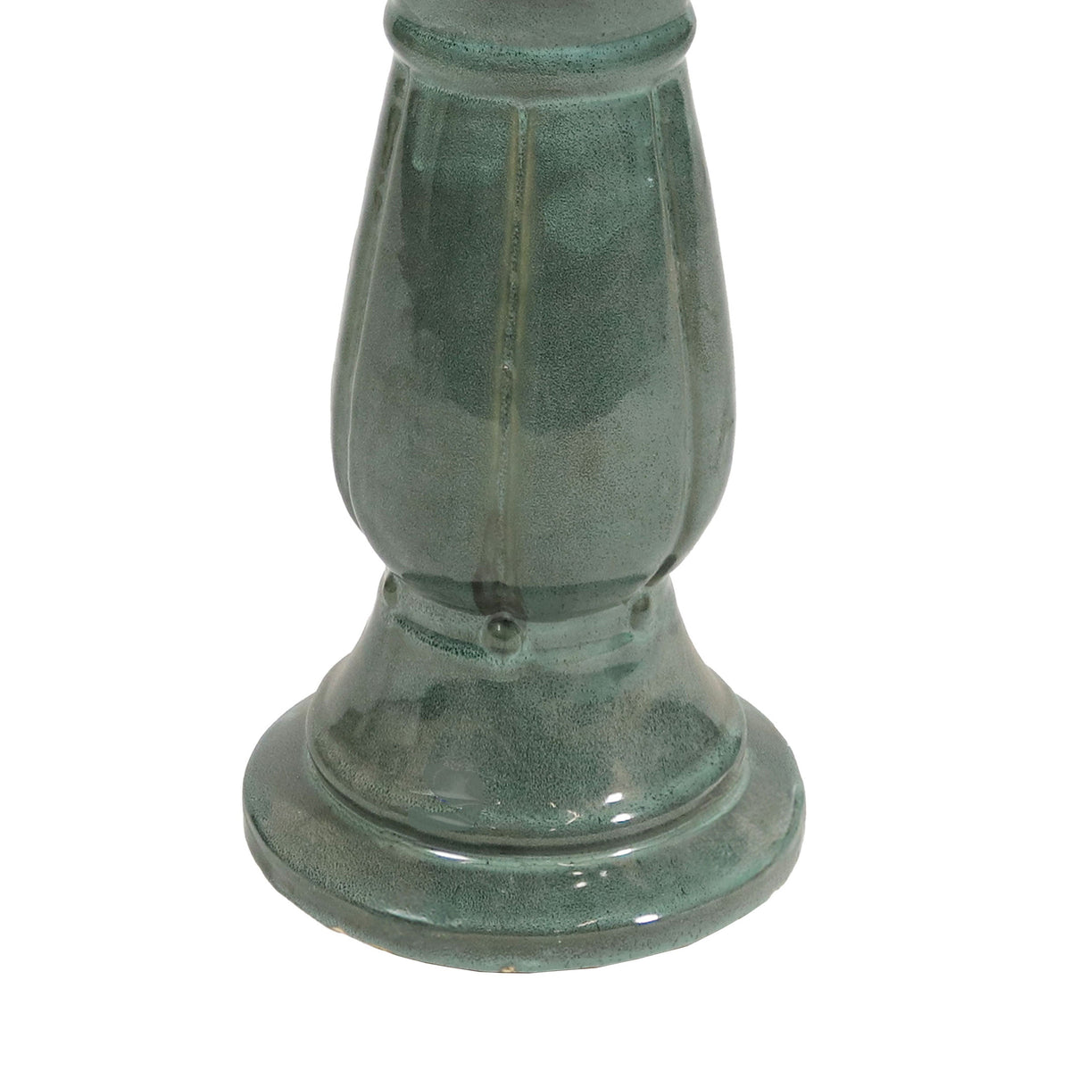 Green ceramic vase on a white background